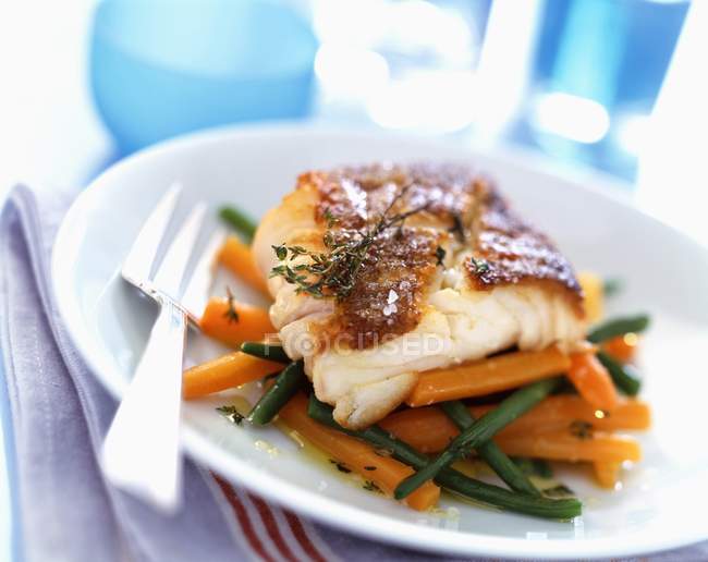 Grilled cod with vegetables — Stock Photo