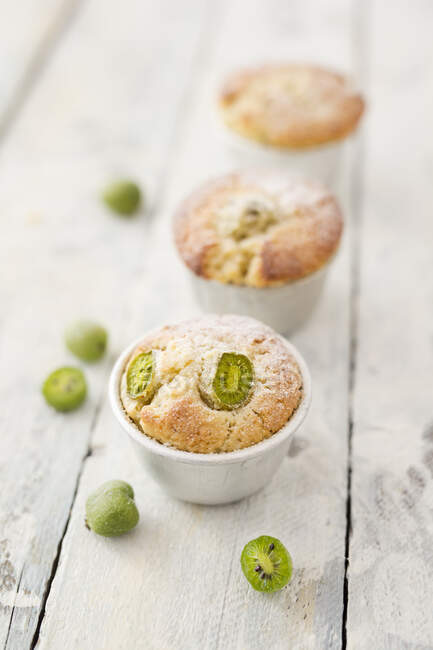 Almond muffins with kiwi berries — Stock Photo