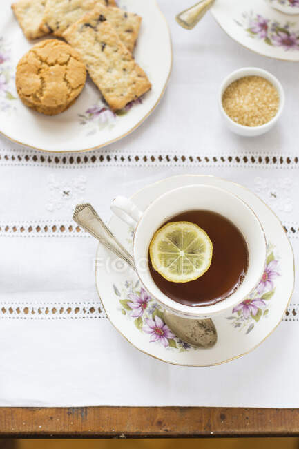 Afternoon tea with biscuits — Stock Photo