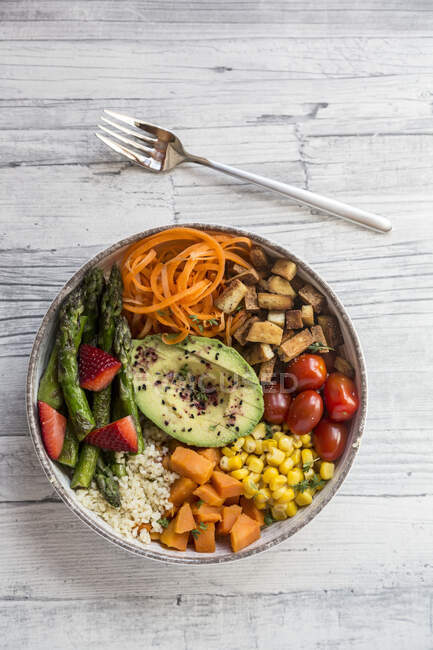 Buddha bowl with vegetables and bulgur, top view — Stock Photo