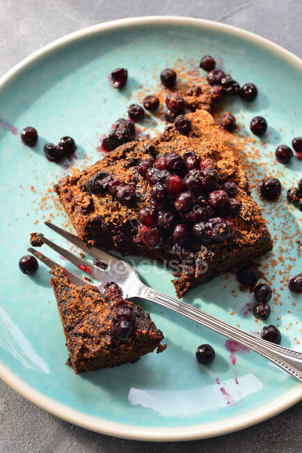 Brownie with blueberries and fork — Stock Photo