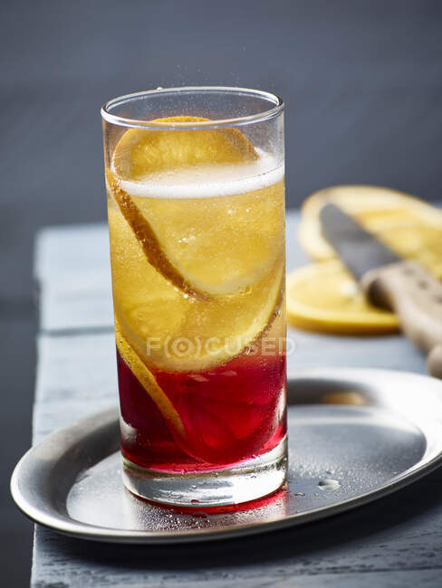 A champagne cocktail with Campari — Stock Photo