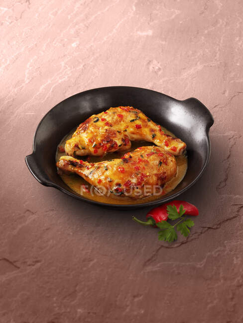 Chicken legs in chili sauce — Stock Photo