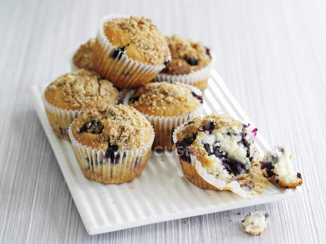 Blueberry muffins on the white background — Stock Photo