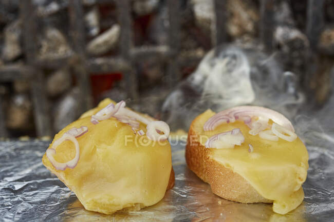 Raclette on a barbeque — Stock Photo