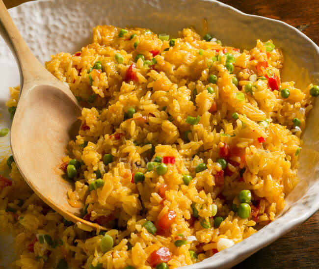Saffron rice with peas and paprika — Stock Photo