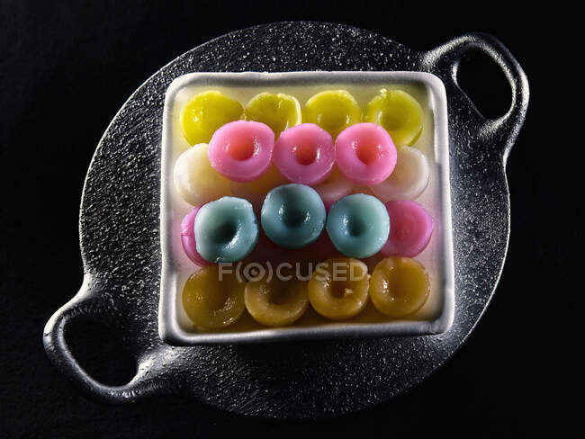 Jelly candies on black background — Stock Photo