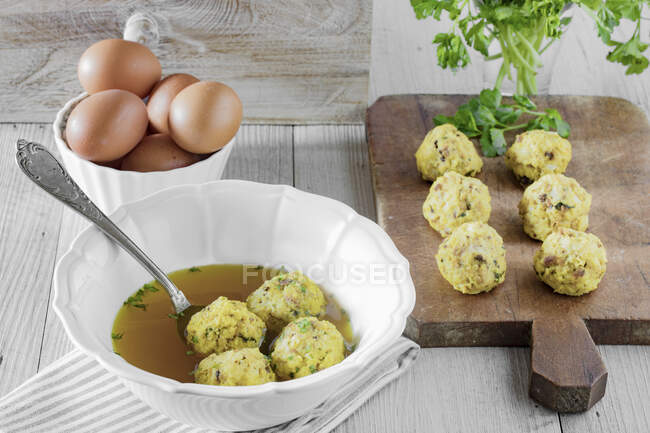 Canederli, typical bread dumplings with speck, eggs and parsley — Stock Photo