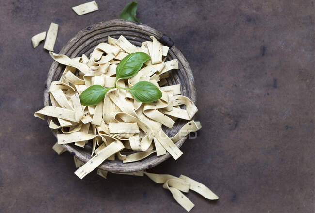 Herb tagliatelle with basil — Stock Photo