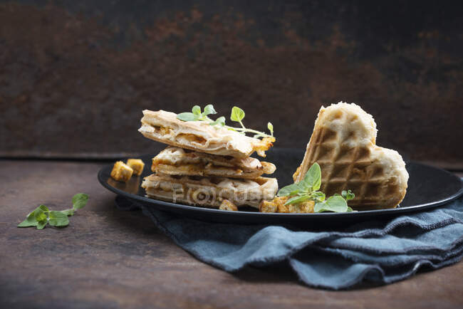 Pizza waffles filled with tomato sauce, almond cheese and tofu — Stock Photo