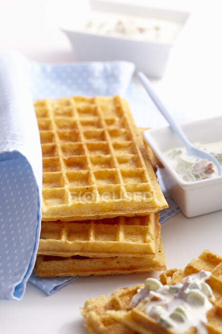 Cheese and spelt waffles with a sour cream and bacon dip — Stock Photo