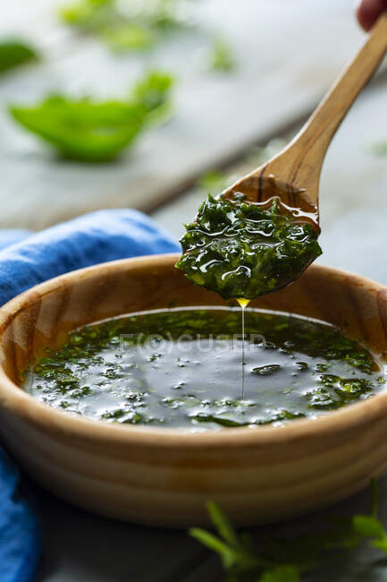 Olive oil with parsley — Stock Photo