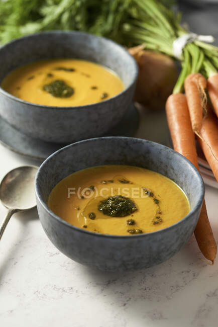 Homemade carrot soup with salsa verde — Stock Photo