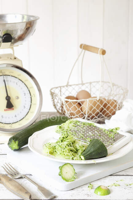 Grated Courgettes in a Vintage Setting — Stock Photo