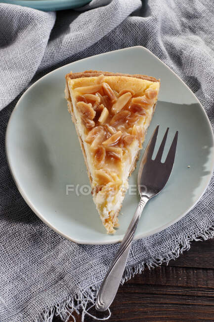 Almond cake with fork — Stock Photo