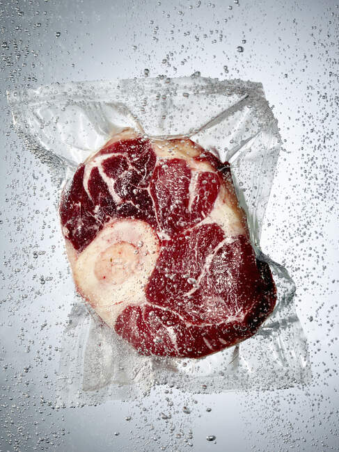 Beef shank in a sous vide bag — Stock Photo