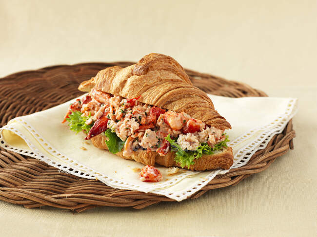 Close-up shot of delicious Croissant with Lobster Salad — Stock Photo