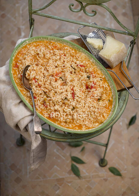 Risotto with tomatoe and basil — Stock Photo