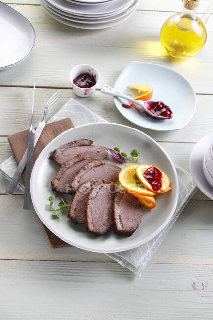 Duck breast with orange and cranberries — Stock Photo