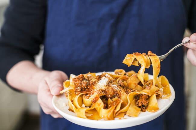 Pappardelle al rag, tagliatelle with meat sauce, Italy — Stock Photo