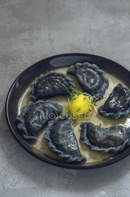 Black wareniki (Russian ravioli) — Stock Photo