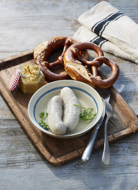 White sausages with pretzels and sweet mustard — Stock Photo