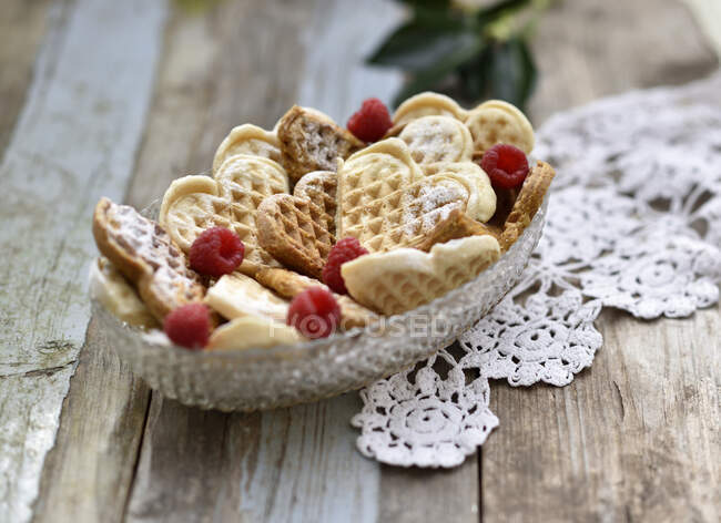 Heart shaped waffles in a glass bowl (vegan) — Stock Photo