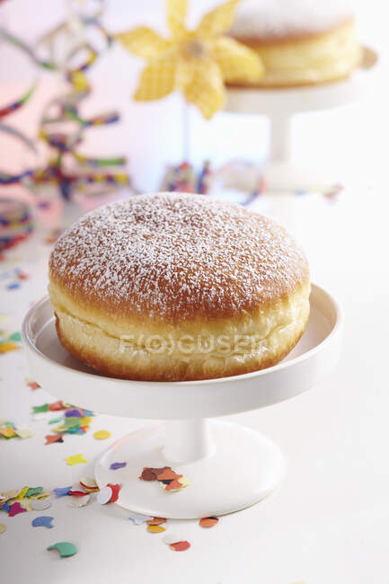 A carnival doughnut with rose hip jam — Stock Photo