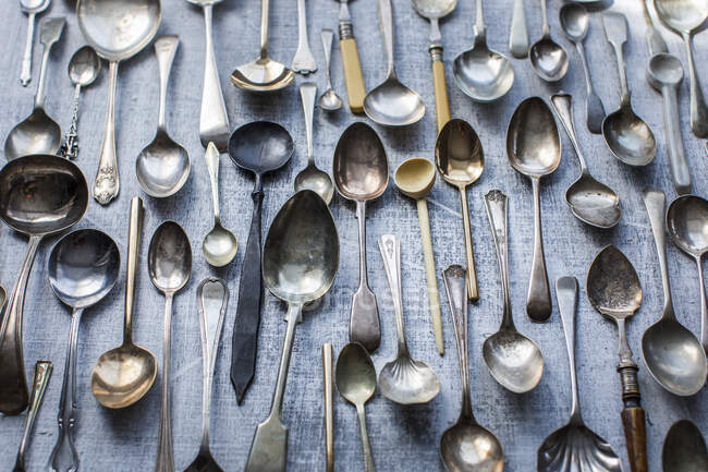 Many different old spoons — Stock Photo