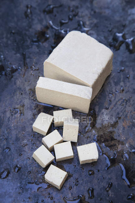 Tofu, sliced and cubed — Stock Photo
