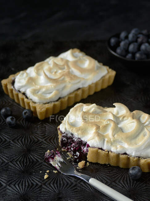 Blueberry tartlets with a meringue topping — Stock Photo