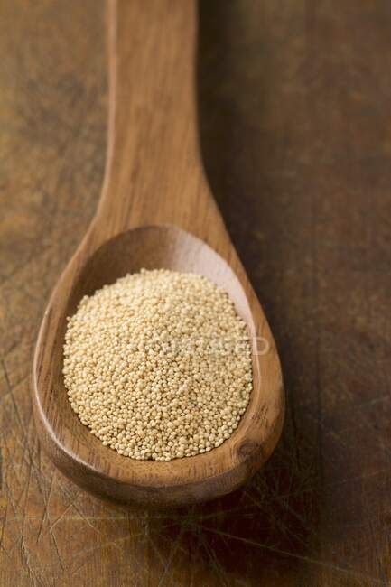 Amaranth on a wooden spoon — Stock Photo