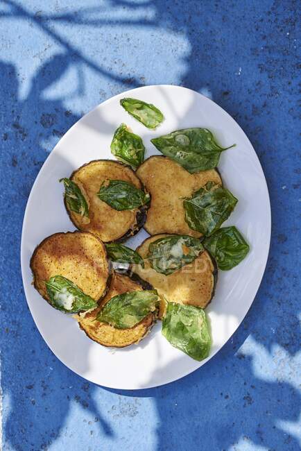 Eggplant fritters with basil — Stock Photo