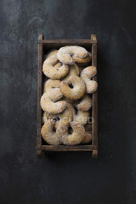 Vanilla cookies in wooden crate, top view — Stock Photo