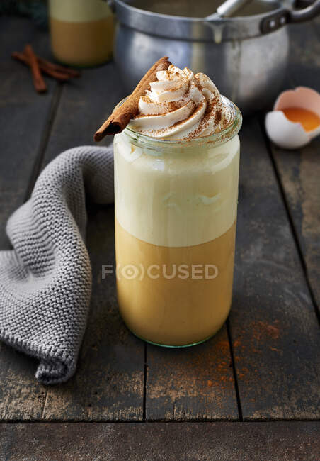 Eggnog topped with cream — Stock Photo