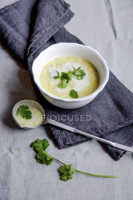 Parsnip and potato soup on grey napkin — Stock Photo
