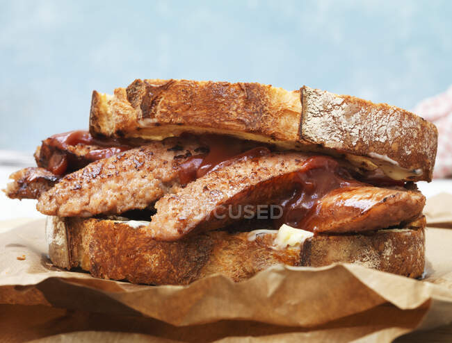 Sausage in bread roll — Stock Photo