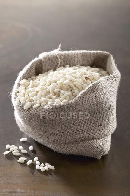 Risotto rice in a small sack — Stock Photo