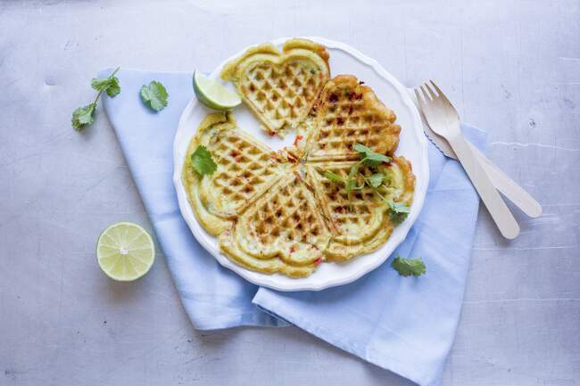 Heart waffles with lime and coriander — Stock Photo
