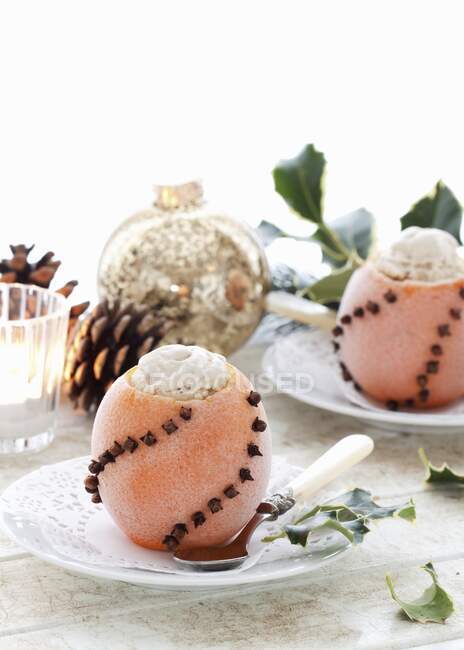 Orange Clove Ice Cream in a pomander orange shell — Stock Photo