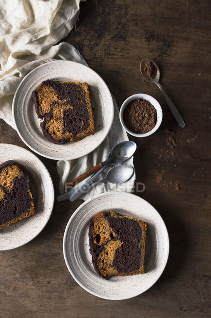 Slices of a pumpkin and chocolate pound cake — Stock Photo