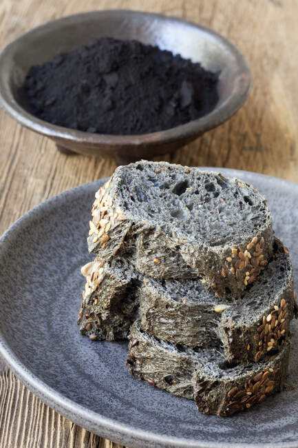 Black bread with activated charcoal — Stock Photo