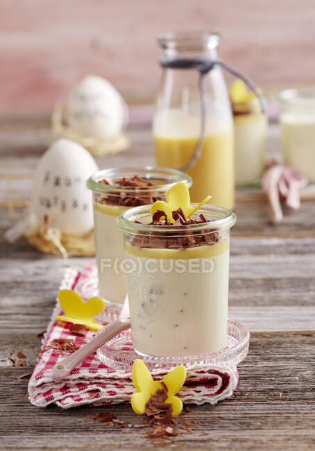 Ricotta and egg liqueur cream desserts in glasses — Stock Photo