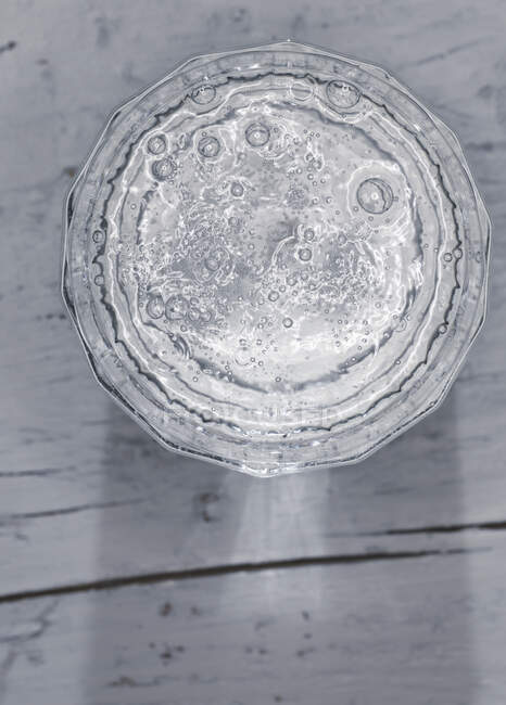 A glass of sparkling water (top view) — Stock Photo