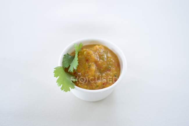 Vegetable sauce in a styrofoam bowl — Stock Photo