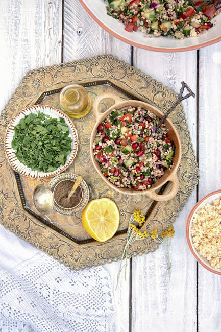 Homemade quinoa salad with herbs and spices — Stock Photo
