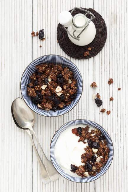 Muesli with dried cherries, buckwheat and coconut pieces — Stock Photo
