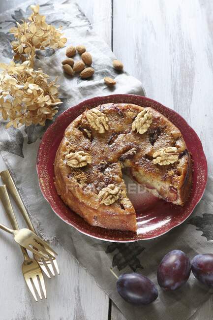 Gluten-free plum cake with walnuts, almonds and coconut blossom sugar — Stock Photo