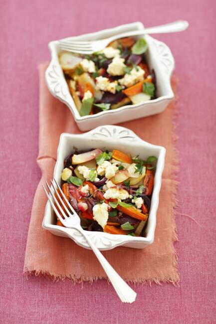 Oven-baked vegetables (beetroot, potato, carrot) baked with feta — Stock Photo
