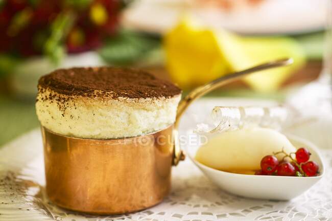 Sweet souffle with cocoa, sorbet and berries — Stock Photo